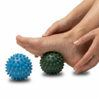 green spikey foot massage ball for circulation and foot health