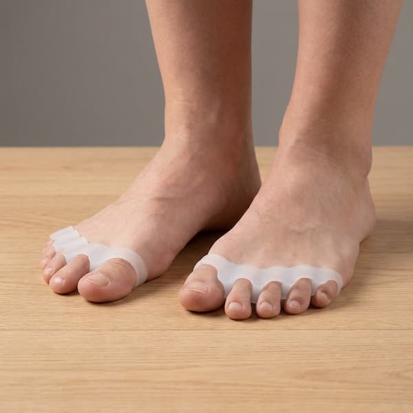 white toe spacer pair. foot pain. toe splay. bunions. plantar fasciitis